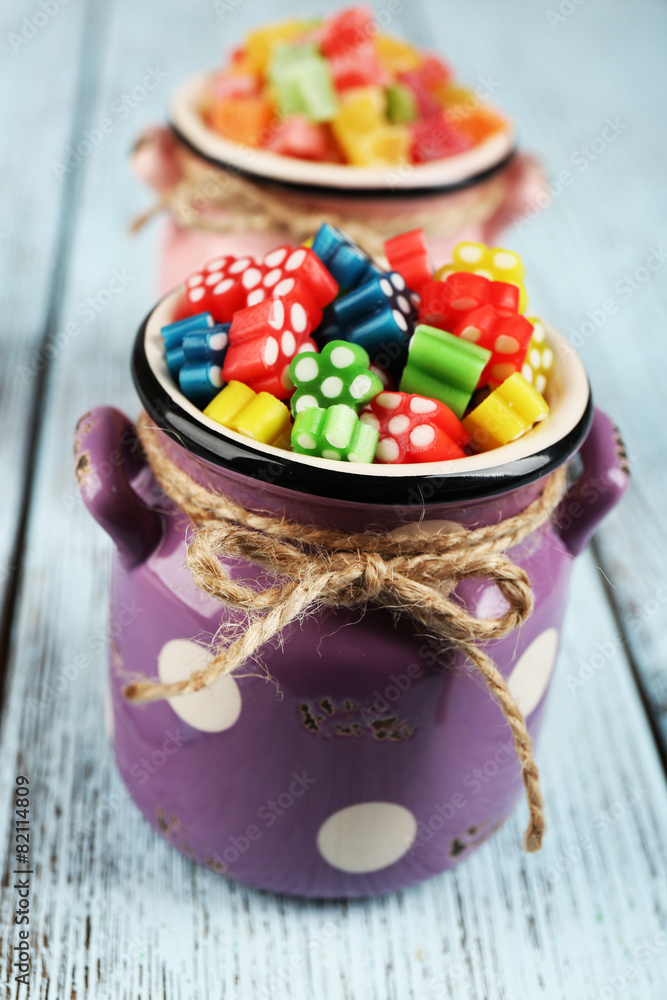 Sweet candies on wooden table, closeup