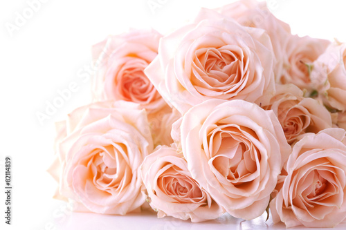 Bouquet of beautiful fresh roses isolated on white