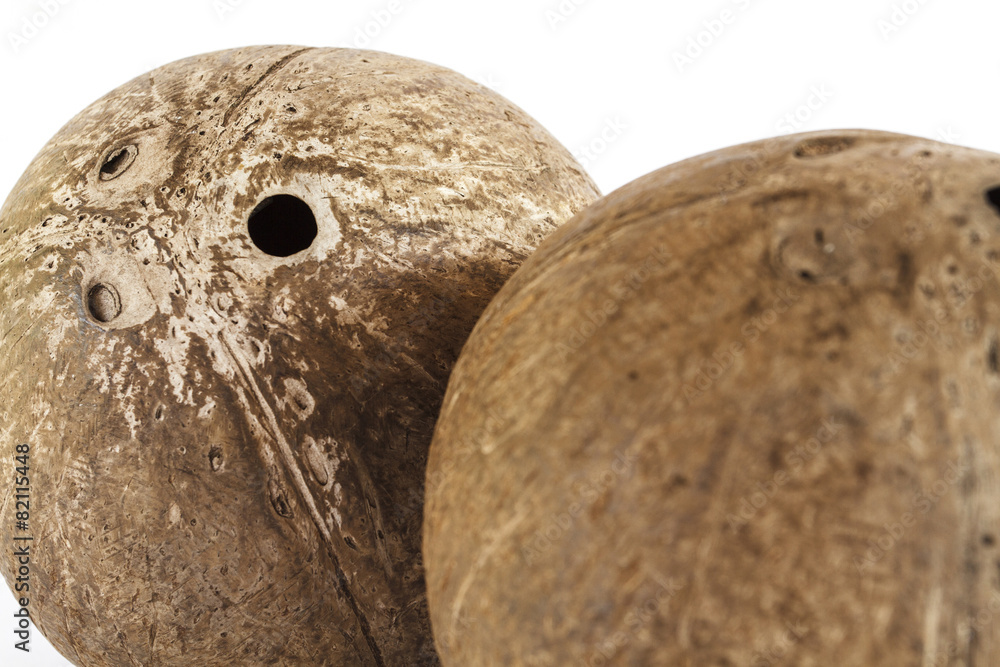 Fototapeta premium Coconut shell on a white background and Coconut shell texture