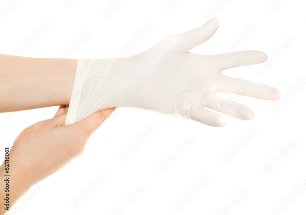 Woman wears medical gloves isolated on white
