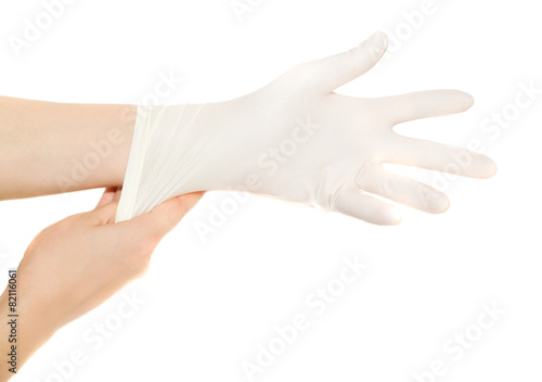 Woman wears medical gloves isolated on white © intueri