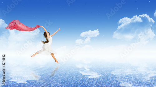 Girl dancer on water surface