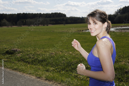 young woman jogging outdoors