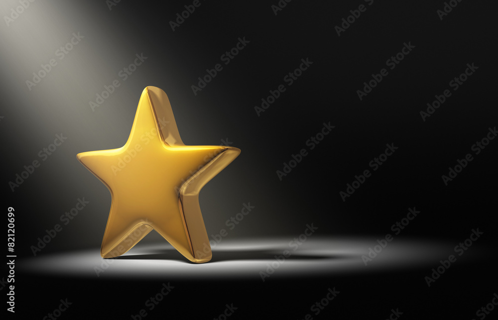 Obraz premium Spotlight On Gold Star On Dark Background