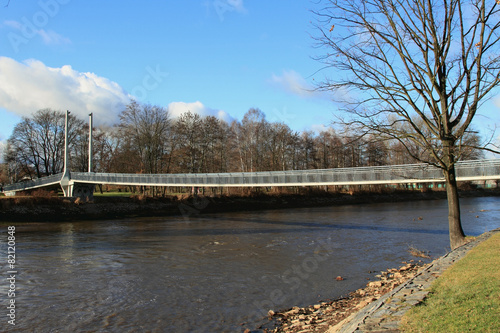 Fototapeta Naklejka Na Ścianę i Meble -  Bridge through river. Ceske Budejovice, Czech Republic