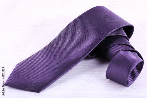 Elegance tie on wooden table background