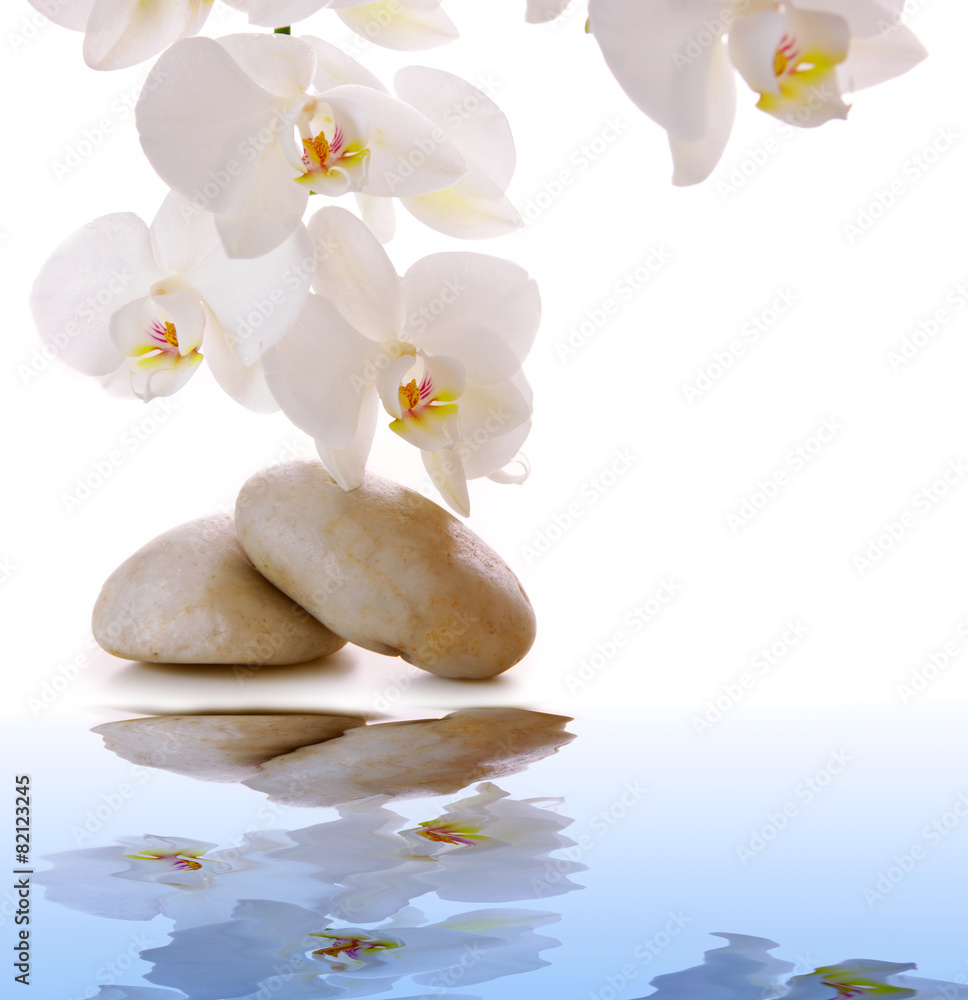 Massage Stones with white Orchid. Massage Stones with white Orchid.