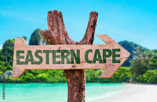 Eastern Cape wooden sign with beach background