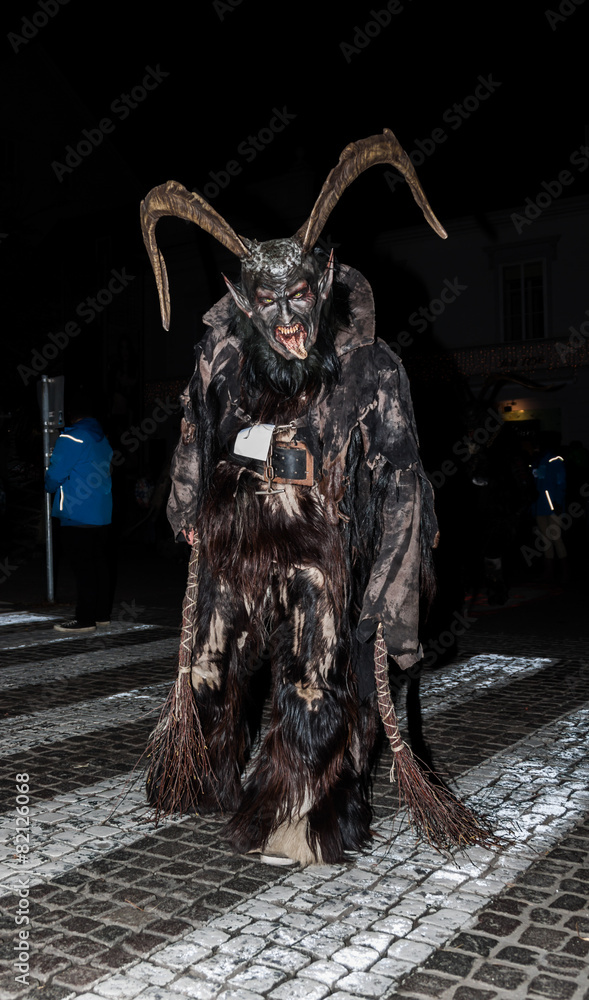 Perchten und Krampuse auf einem Perchtenlauf - Masken und Felle Stock Photo  | Adobe Stock