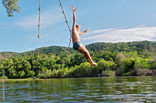 Old man dives into lake