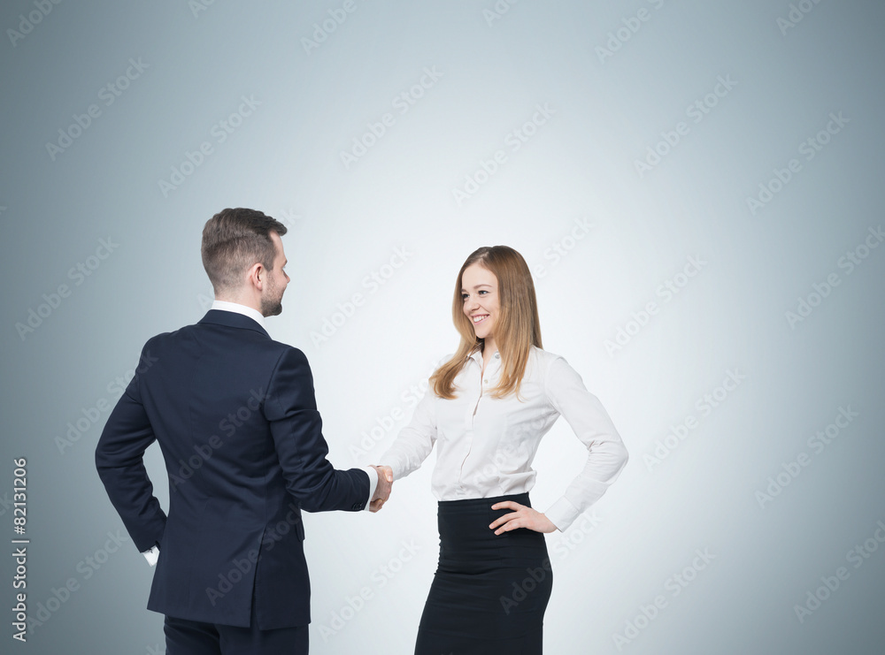 Young couple at the business meeting. Young couple at the business meeting.