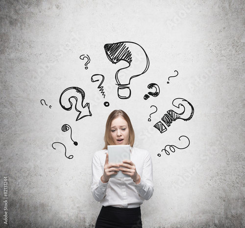 Quadro em tela Young business woman is thinking