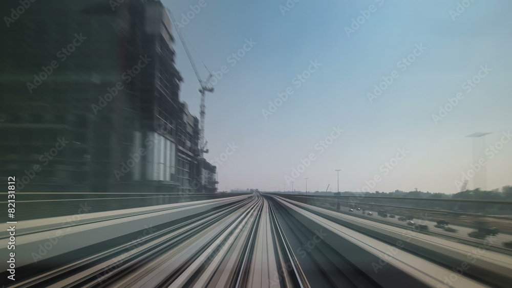 Dubai Metro. A view of the city from the subway car, Dubai, UAE Dubai Metro. A view of the city from the subway car, Dubai, UAE