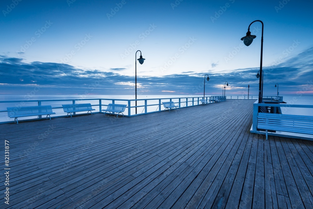 Beautiful morning seascape with wooden pier
