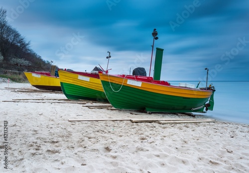 Landscape with Baltic Sea. Fishing boat on the beach. 