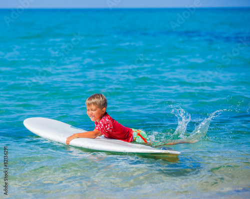 Boy with surf © Max Topchii