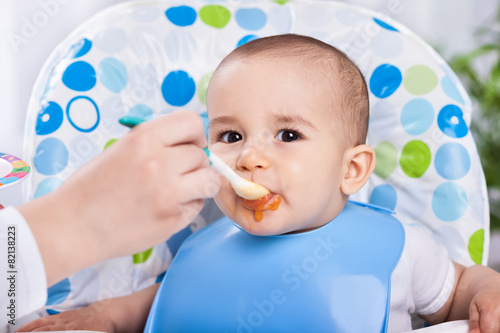 Dirty cute baby enjoy when eating food