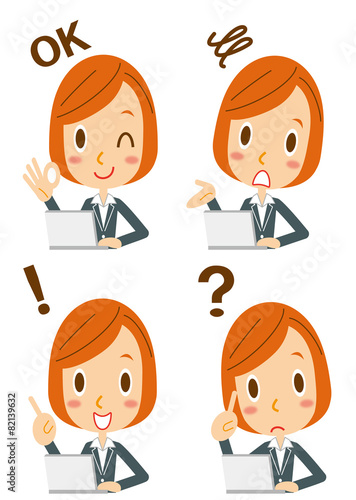 表情　ノートパソコンを使うショートヘアのビジネスウーマン