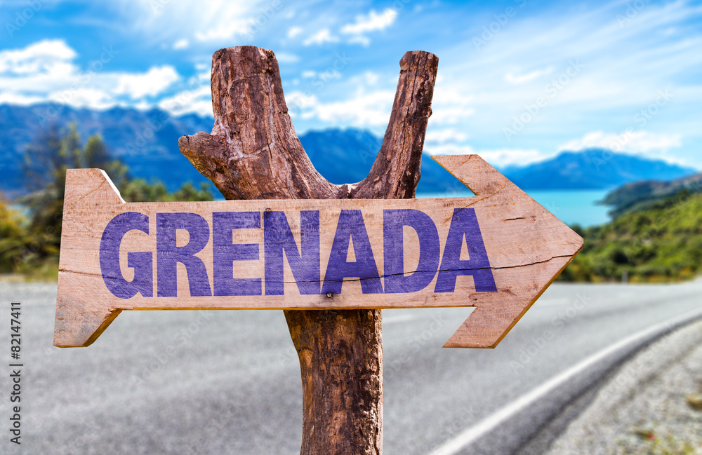 Grenada wooden sign with road background
