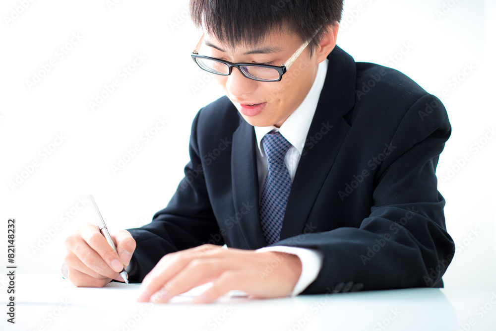 Business man signing a contract Business man signing a contract