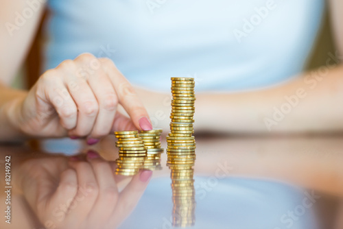 Lady Counting Coins - Australian Currency photo