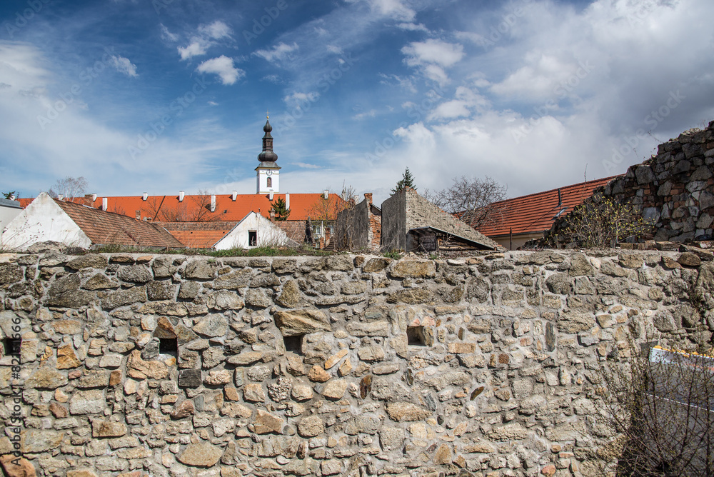 Old city panorama with the stone wall and church