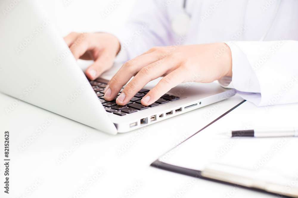 Close-up of a medical worker with laptop Close-up of a medical worker with laptop
