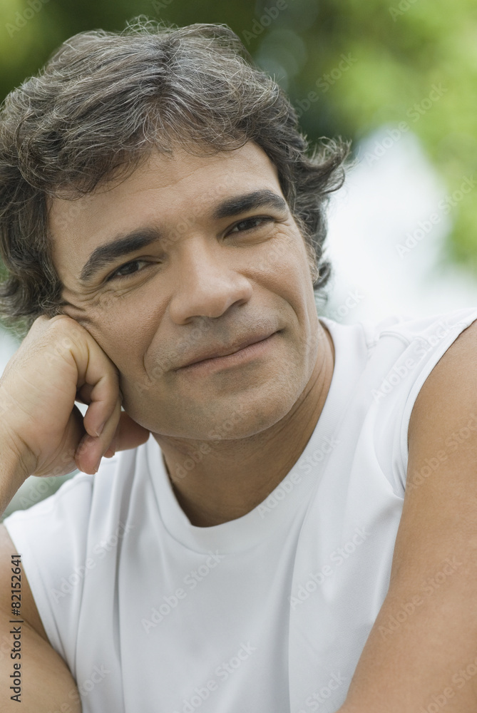 Confident Hispanic man smiling Confident Hispanic man smiling