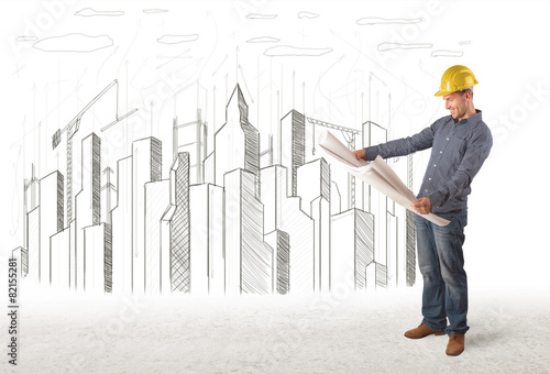 Engineer man with building city drawing in background