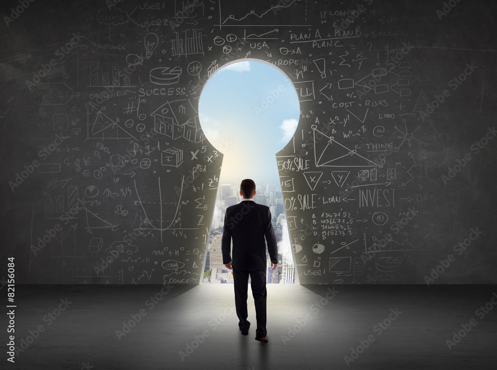Fototapeta premium Business man looking at keyhole with bright cityscape concept