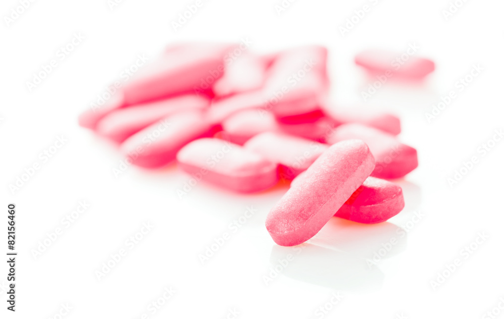 Group of pink medical pills isolated Group of pink medical pills isolated