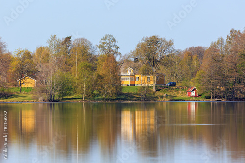 Houses on the hill by the lake