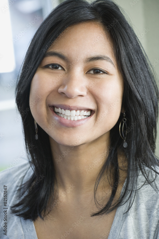 Close up of Mixed Race woman smiling Close up of Mixed Race woman smiling