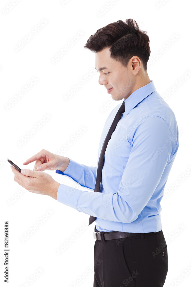 young smiling businessman with smart phone young smiling businessman with smart phone