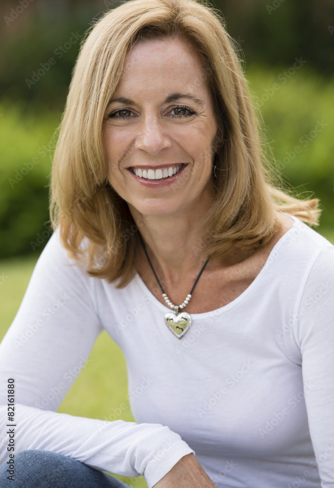 Caucasian woman smiling outdoors Caucasian woman smiling outdoors
