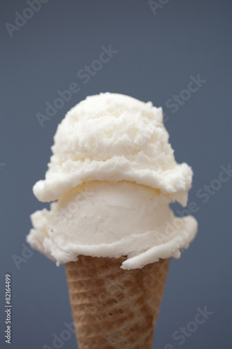 Close up of vanilla ice cream cone photo