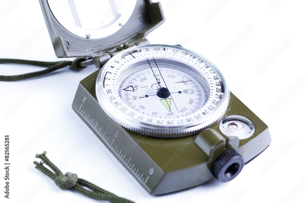 Military compass on a white background. Military compass on a white background.
