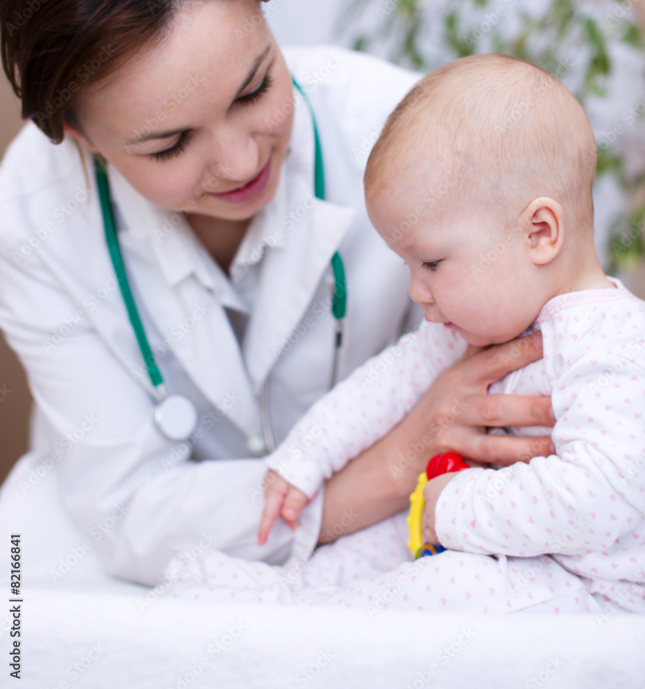 Doctor is examining little child Doctor is examining little child