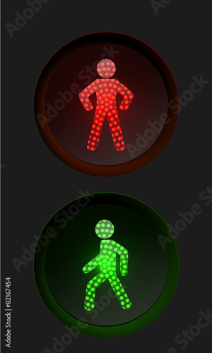 pedestrian traffic lights with red and green lamps on.