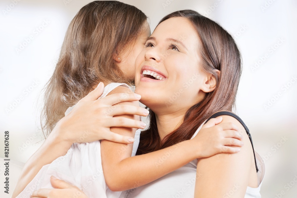 Adorable. Happy cheerful family. Mother and baby kissing Adorable. Happy cheerful family. Mother and baby kissing