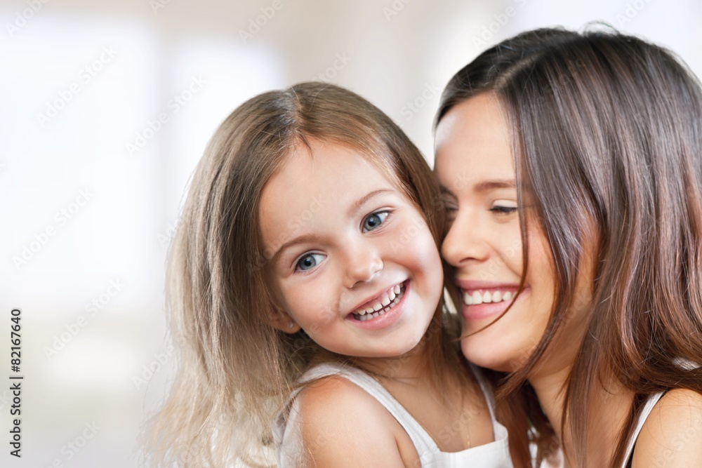 Mum. Mother and Baby kissing and hugging at Home. Happy Smiling Mum. Mother and Baby kissing and hugging at Home. Happy Smiling