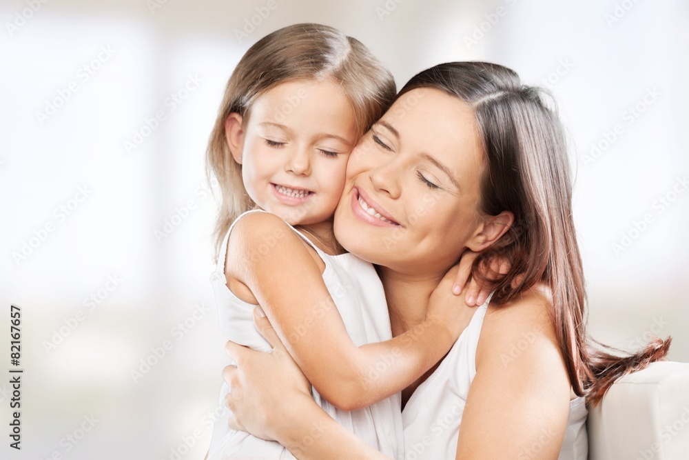 Mother. Family, child and happiness concept - hugging mother and Mother. Family, child and happiness concept - hugging mother and