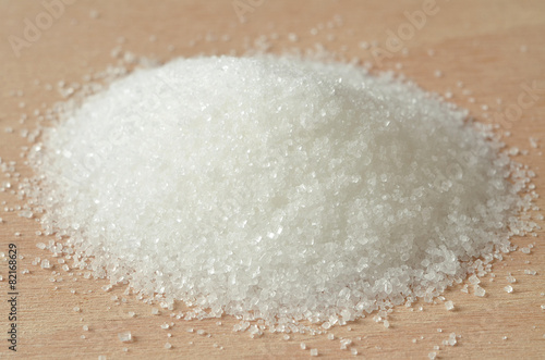 Heap of white granulated crystal sugar