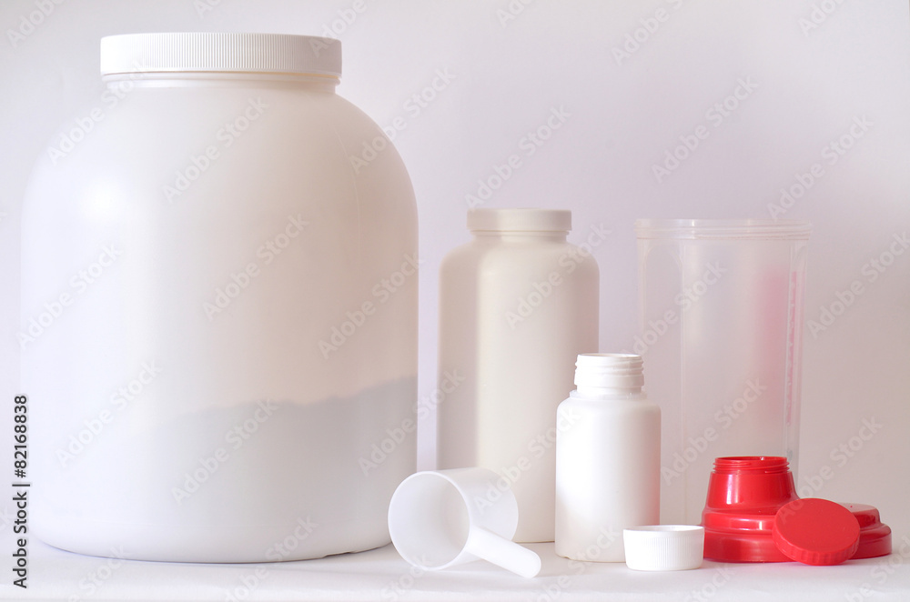 Big jar of protein powder, bottles and shaker Big jar of protein powder, bottles and shaker