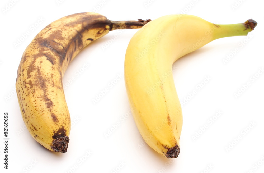 Fresh and overripe bananas on white background Fresh and overripe bananas on white background