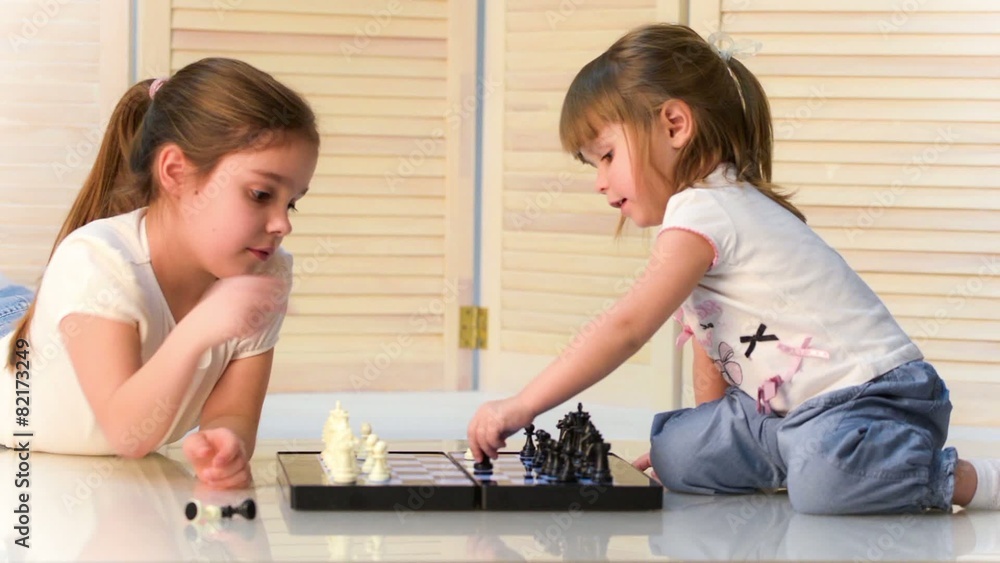 Children playing chess Children playing chess