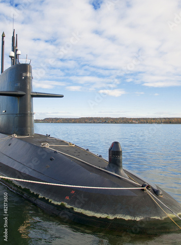 Nuclear submarine moored in the port.