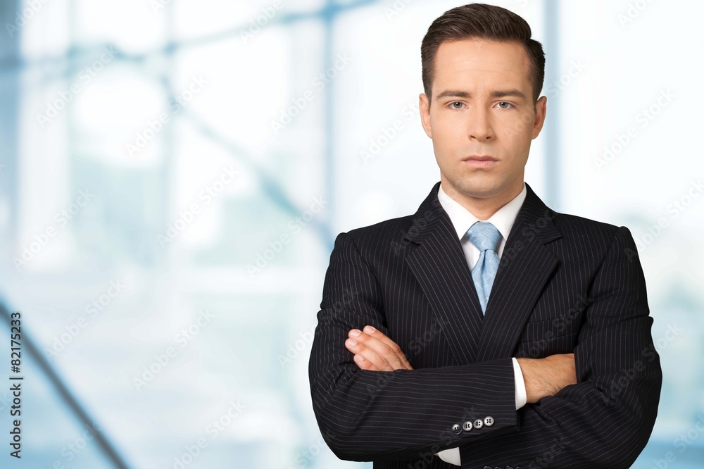 Businessman. Proud Businessman with arm crossed Businessman. Proud Businessman with arm crossed
