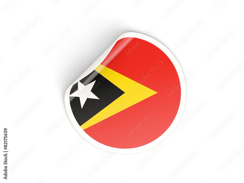 Naklejka premium Round sticker with flag of east timor