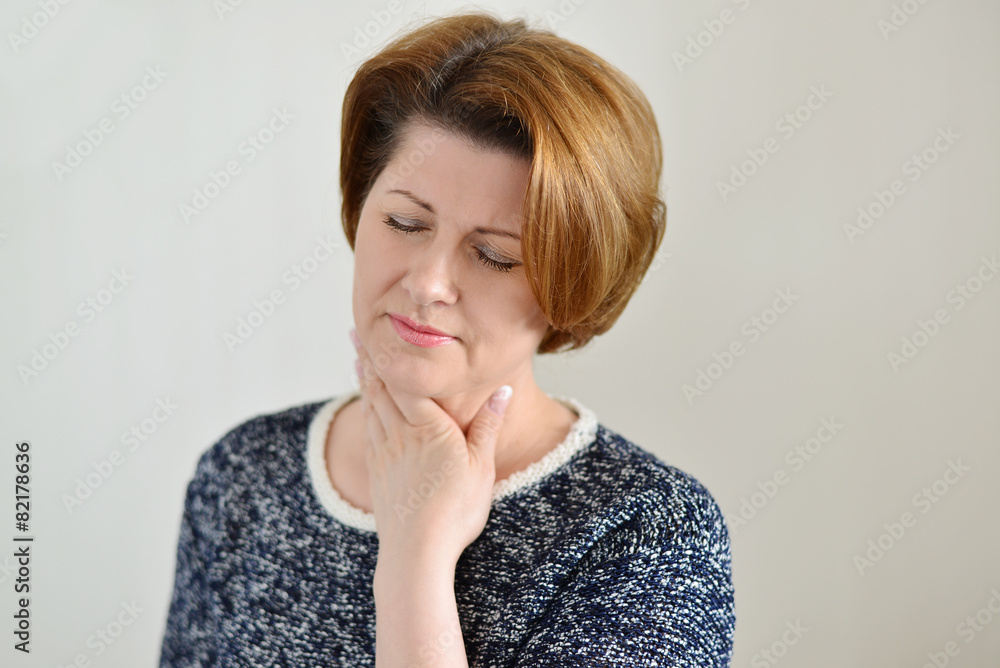 Adult woman with a sore throat Adult woman with a sore throat